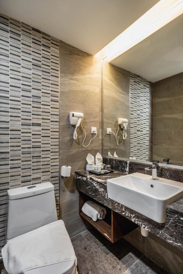 Ano Hotel Miri Bagian luar foto